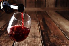 Red wine pour  from bottle